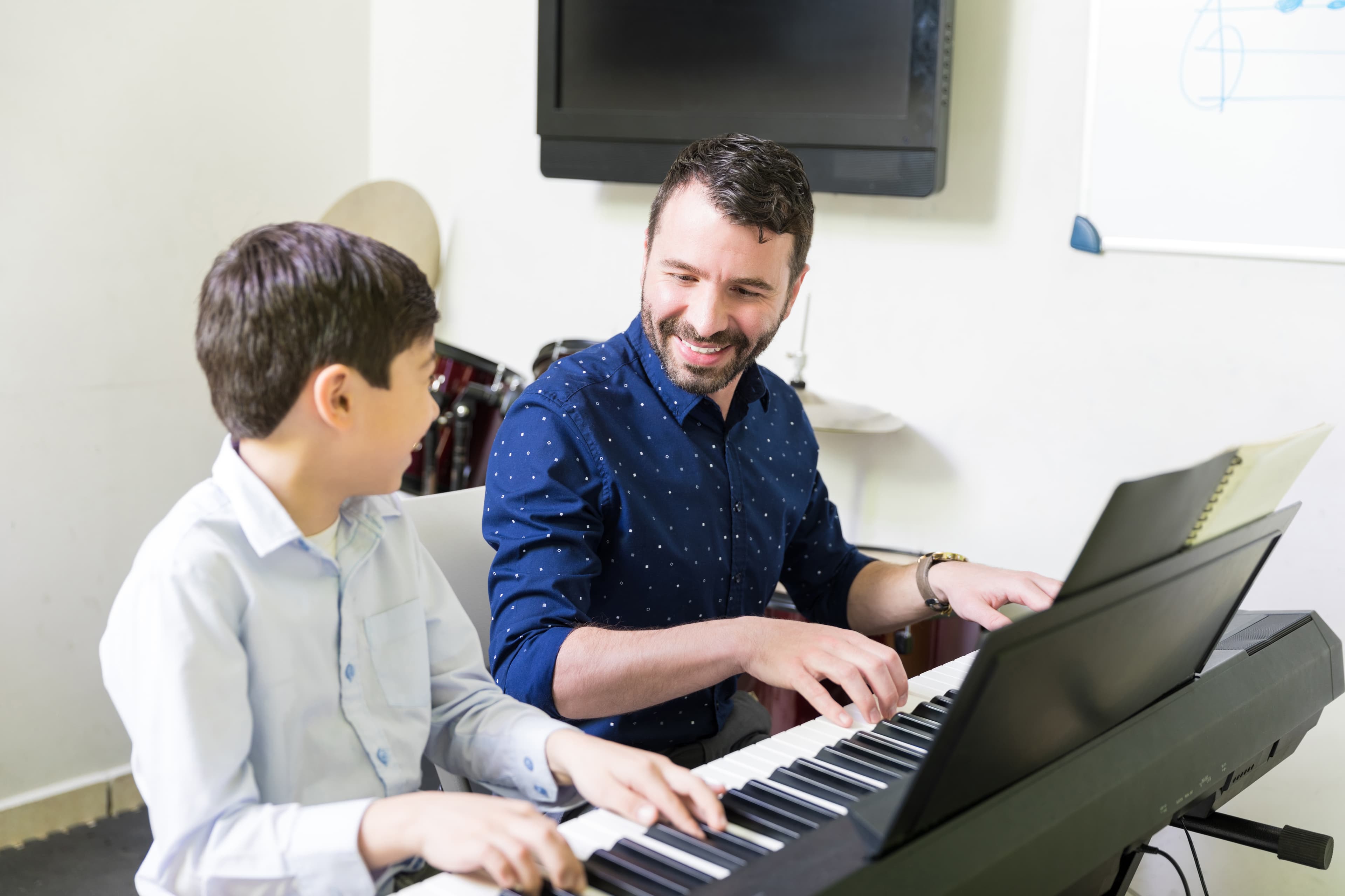 Student enjoying piano lessons